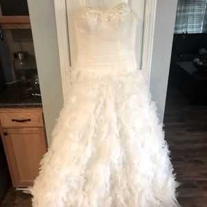 Wedding dress unworn and unaltered. Size 10/12. Bolero size M, crystal headband.